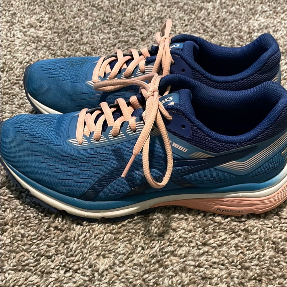 Asics GT 1000 Blue and Pink Athletic Running Shoes with Breathable Design